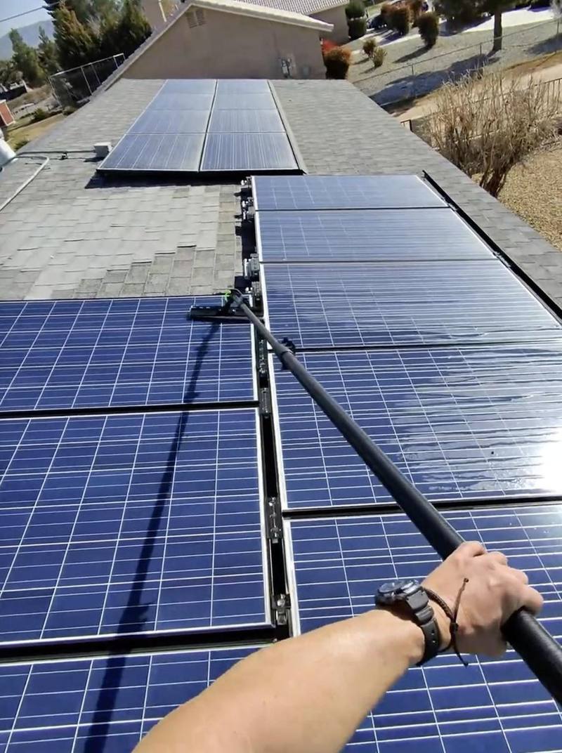 Water fed pole solar panel cleaning high desert CA
